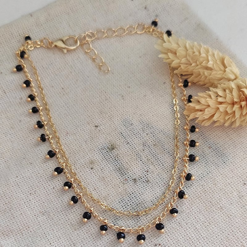 ATELIER MIU Bracelet de cheville avec des pierres cristaux noires - Laiton doré & plaqué or